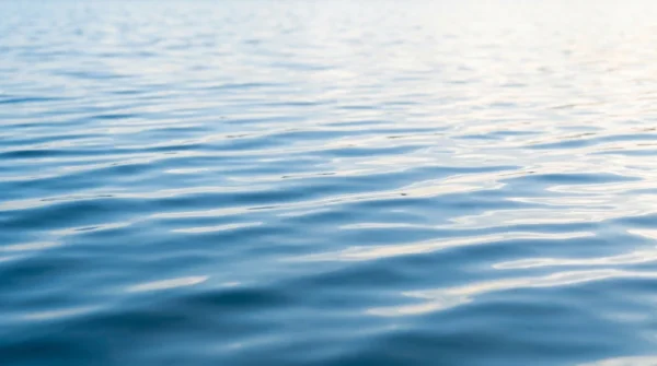 Blue Water Surface Reflection Background